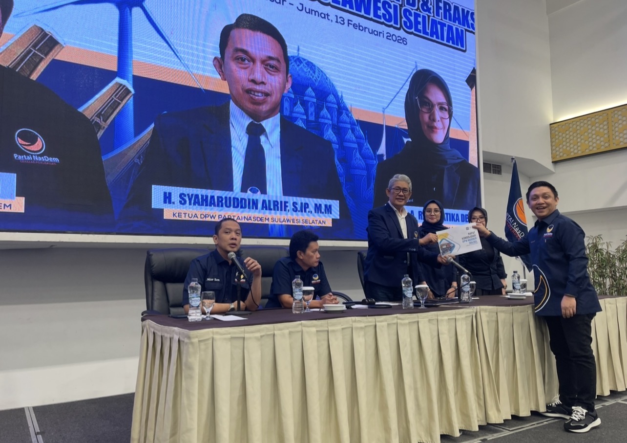 Anggota DPRD Palopo, Umar menyampaikan laporan di rapat konsolidasi DPW NasDem Sulsel, Jumat (13/2/2026).